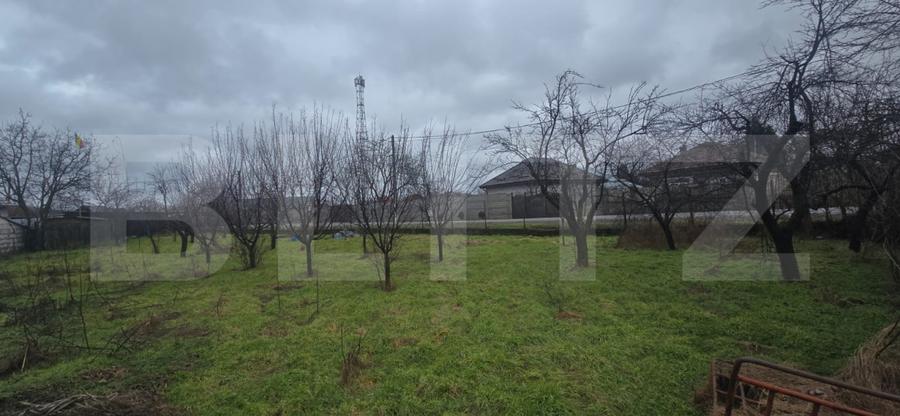 Teren intravilan 1.869 mp, front 80 metri, zona Cârcea - Stadion