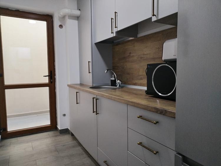 Apartament Studio cu curte proprie - Central