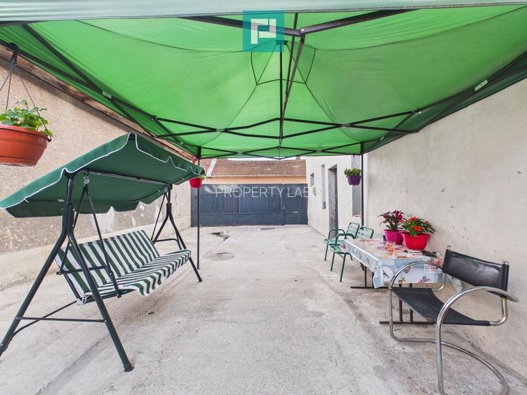 Casă P+E cu două apartamente, zona Drăgășani - 6