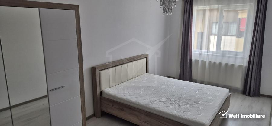 Apartament cu doua dormitoare, parcare proprie, mobilat si utliat