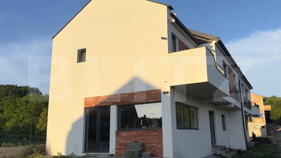 Case tip Duplex, 154/190mp semifinisat, in comuna Chinteni