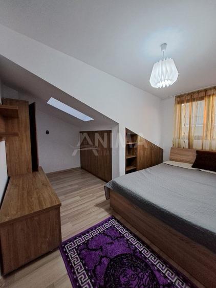 Apartament cu 2 dormitoare + living cu bucatarie, parcare subterana