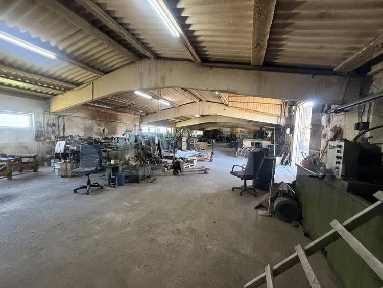 Atelier industrial 1.050 mp, utilat, 4 căi de acces – SAGRICOM