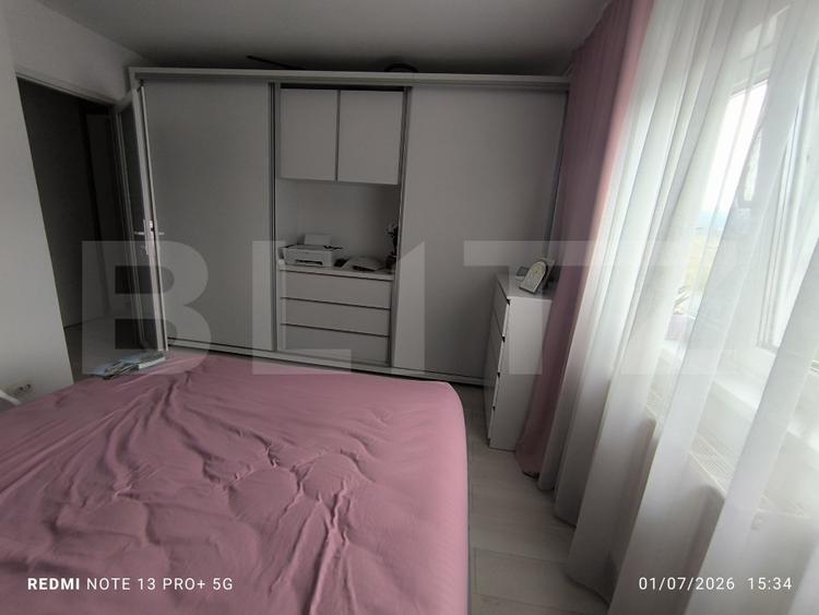 Apartament cu 2 camere, 2 parcari, curte+foisor