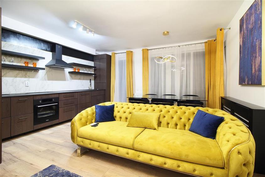 Apartament de lux cu 2 camere, terasa 25 mp, parcare subterana – Central