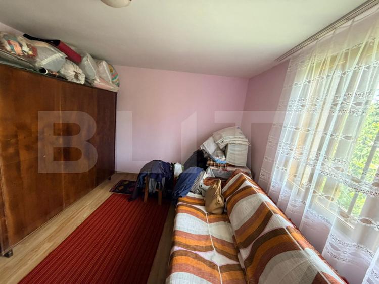 Casă cu 1.192 mp teren, front 22, sat Motoci-com. Mischii