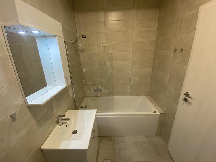 Apartament premium, parcare inclusa. Management profesional.