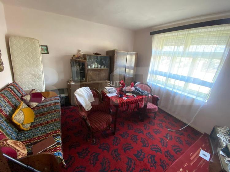 Casă cu teren 10 ari, 2 anexe și dublu front stradal – Beclean