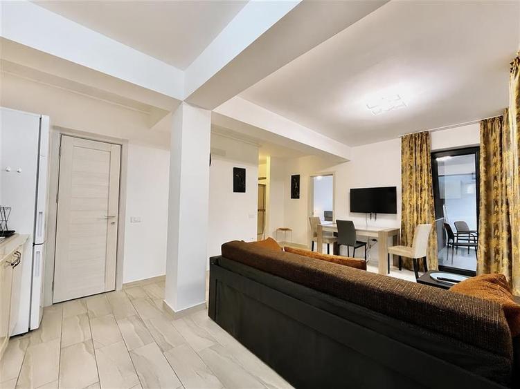 Apartament open space cu 2 camere si parcare in zona Coresi