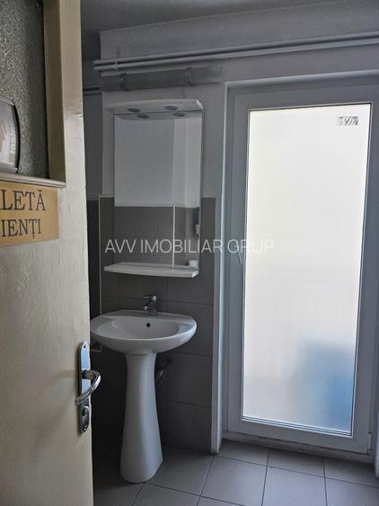 Bulevardul Magheru, Piața Romană - 12