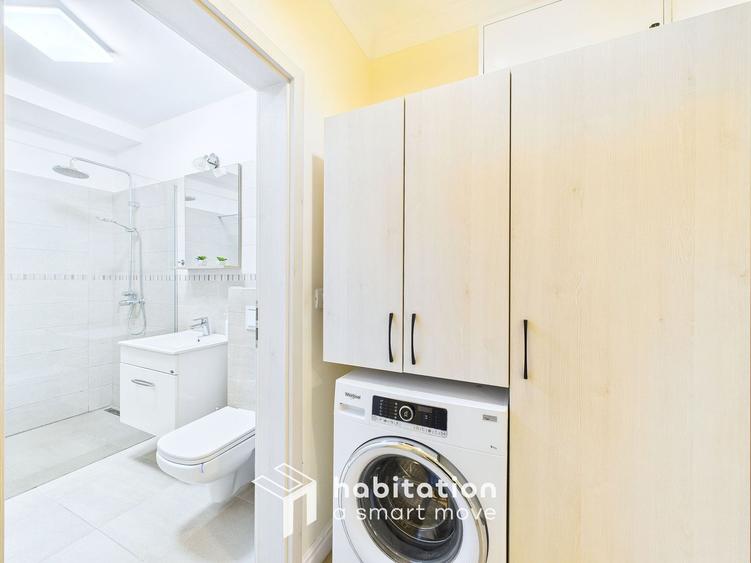 Apartament spațios cu curte și garaj – confortul unei case moderne