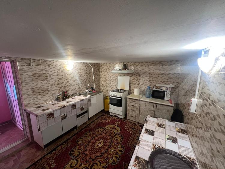 Casa pe parter, 75 mp, teren generos 2000mp, zona Troaca -Rovine 2