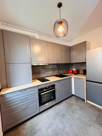 Închiriez apartament 2 camere, cu gradina amenajată in bloc nou.