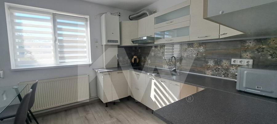 Apartament modern cu 2 camere, curte privată și 2 locuri de parcare