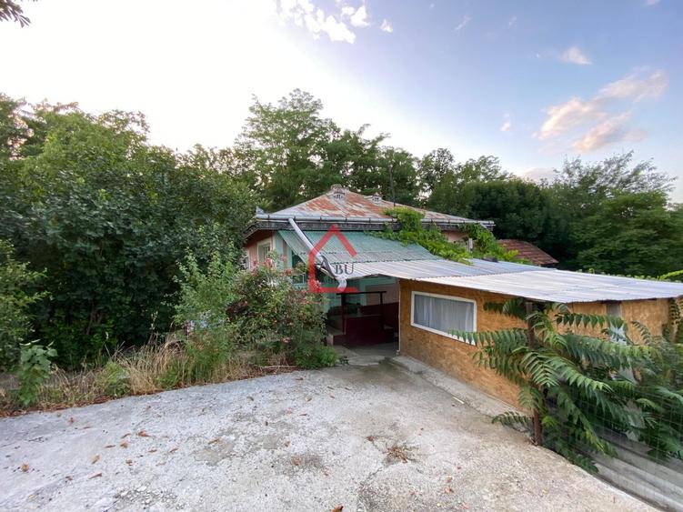Casa batraneasca, locuibila cu teren intravilan de 1.255mp, asfalt