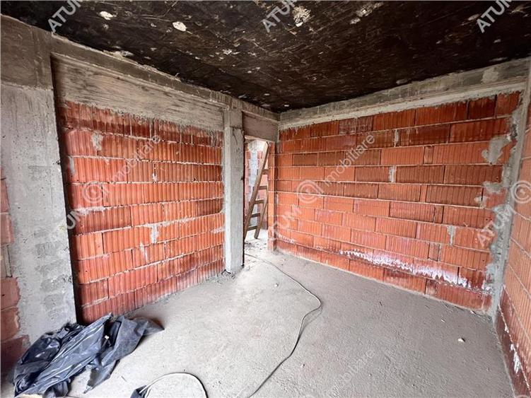 Casa cu 4 camere 2 bai si teren de 230 mp Selimbar