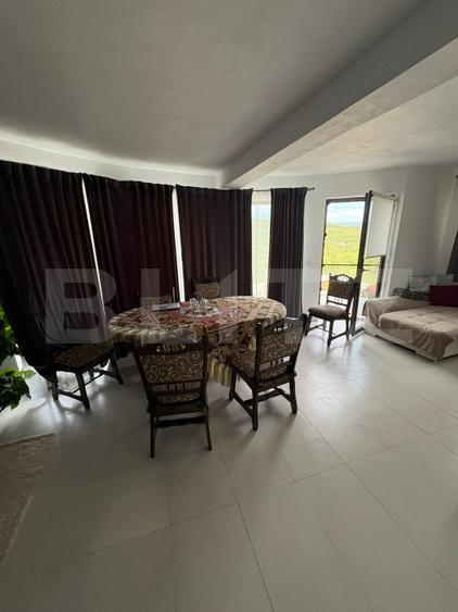 Casă de vânzare 140 mp, 5 ari teren, garaj interior – zona Pensiunea Morariu