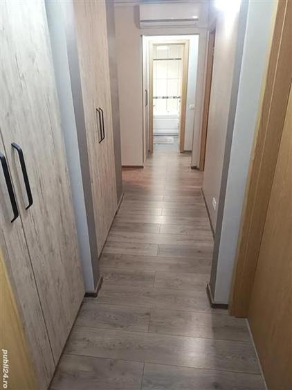 Decomandat, etaj 1 cu 2 bai si 2 balcoane
