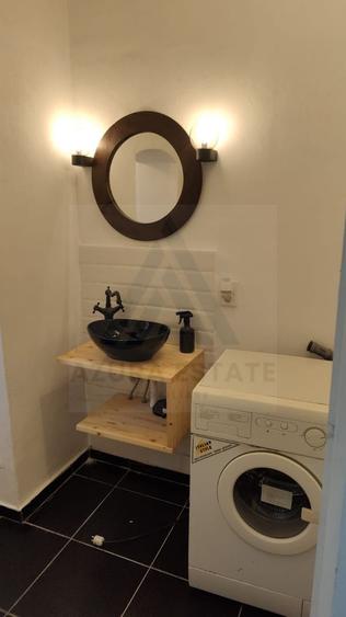 Apartament modern 2 camere 56 mp utili si curte in zona Centrala