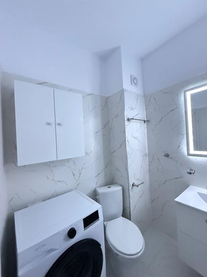 VANZARE APARTAMENT 2 CAMERE COMPARTIMENTARE MODERNA-BALCON LA PARTER