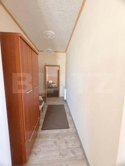 Cladire multifunctionala, pensiune plus casa, parcari private