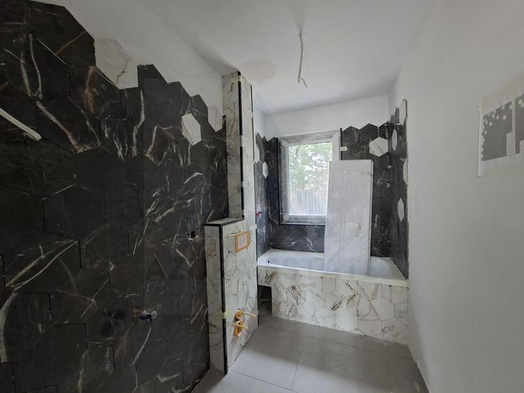 Apartament premium 2 camere 49.7 mp utili si curte 50 mp în Da Vinci