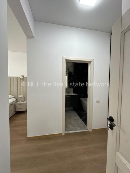 Apartament in Pipera la parter cu 4 camere, curte privată de 30 mp și 2 locuri d