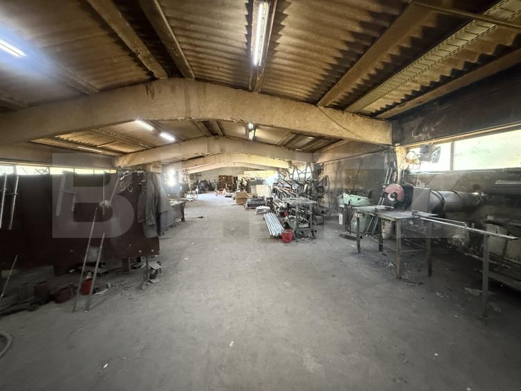 Atelier industrial 1.050 mp, utilat, 4 căi de acces – SAGRICOM