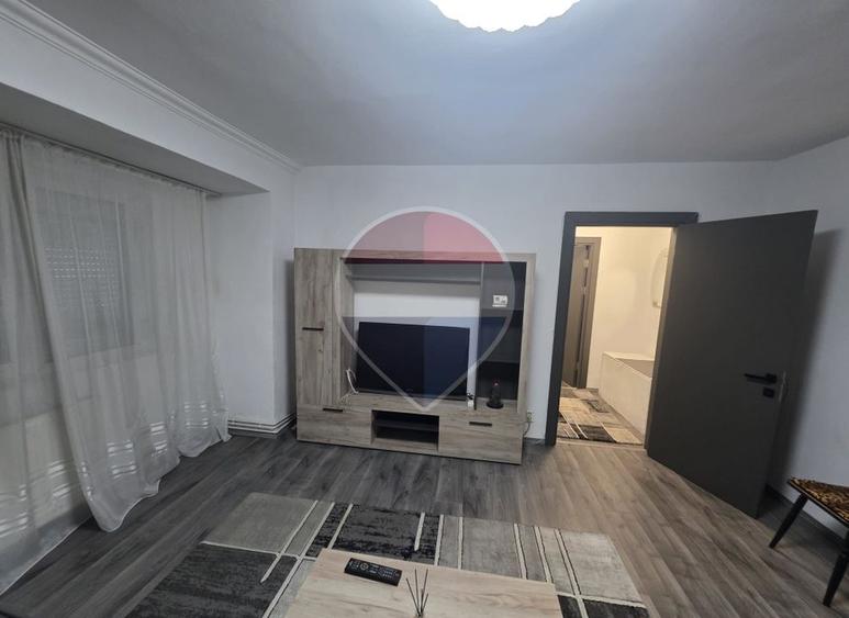 Apartament 2 camere parter inalt centrala gaz zona Dambovita