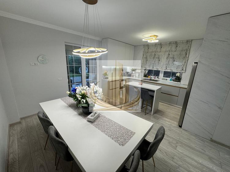 Casa in stil mediteranean, ultrafinisată 5 camere, 3 bai + curte.