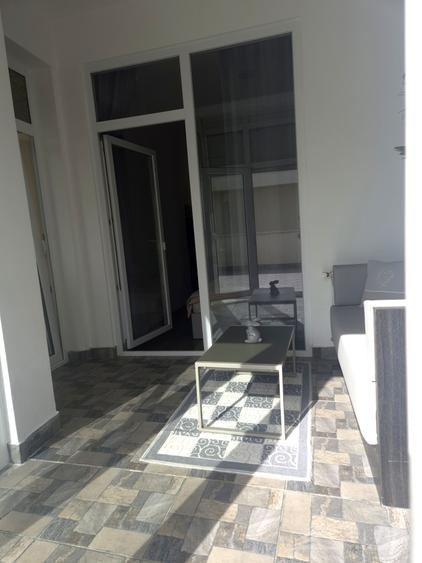 Apartament 2 camere de vânzare în Centru, str. Traian | terasă 50 mp + parcare