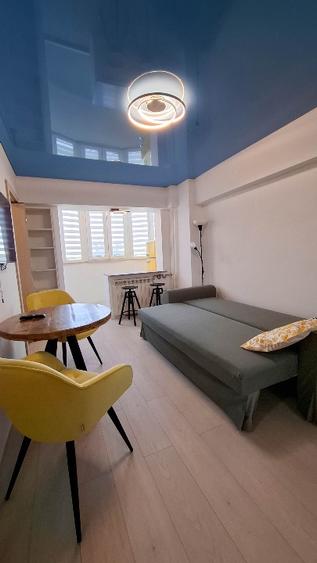 Garsoniera Lux - Amenajata cu stil, ofera confort si utilitate.