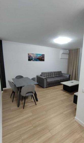 Apartament de 2 camere, 57 mp, parcare, centrala, La Foresta Tunari
