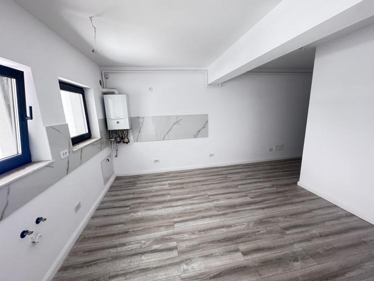 Apartament cu 2 camere-de inchiriat-bloc nou-parcare proprie