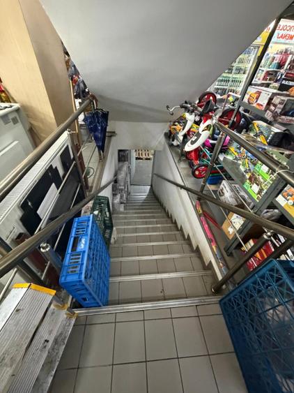 Spatiu comercial , 1300 mp pe 4 nivele, in centrul orasului Filiasi