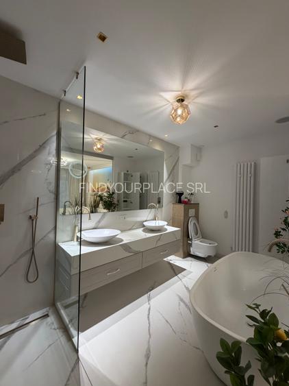 Apartament în Arcadia Domenii,230mp curte,3 parcări incluse