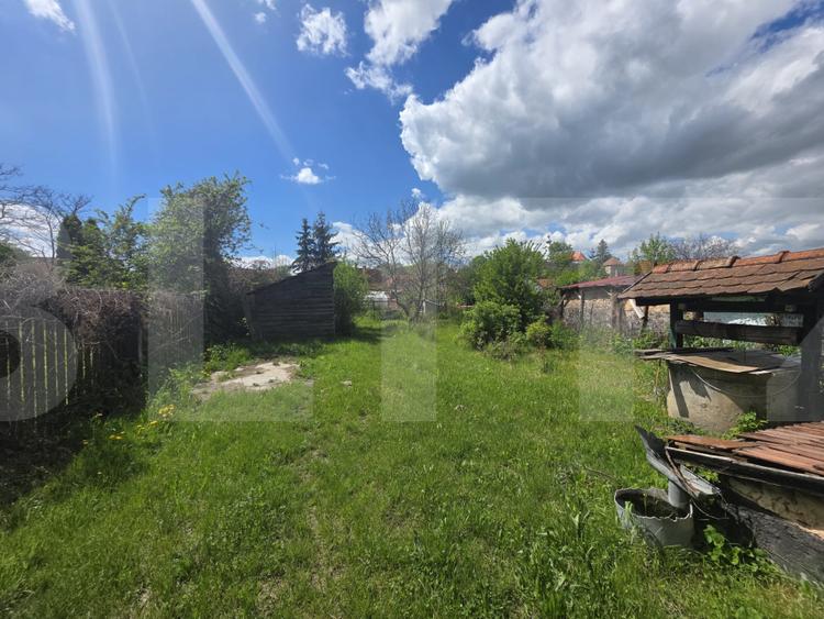 Casă țărănească în centrul localității Ilieni – teren 832 mp.