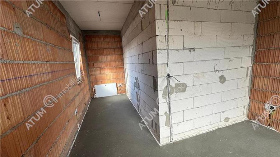 Casa individuala 4 camere 2 bai 120 mp utili 300 mp teren in Sura Mica