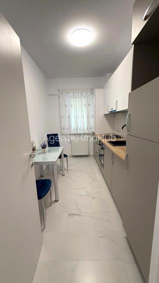 DE INCHIRIAT, APARTAMENT CU LOC DE PARCARE INCLUS IN PRET - 8