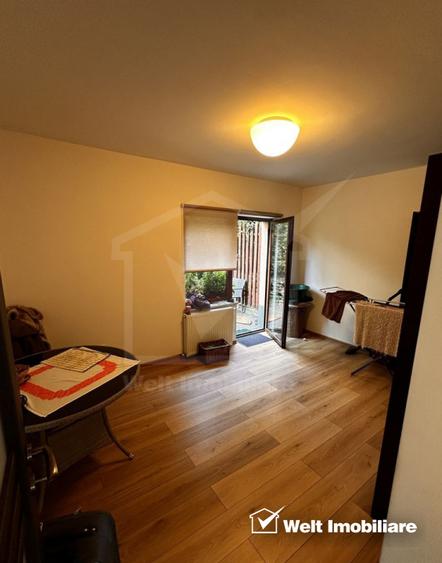 Apartament cu gradina in bloc tip vila, 75 mp util + 120 mp, parcare