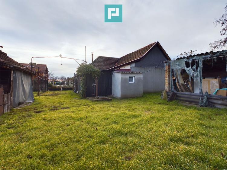 Casă cu teren generos, Turnu