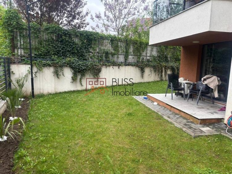 Apartament cu grădină generoasă și parcare