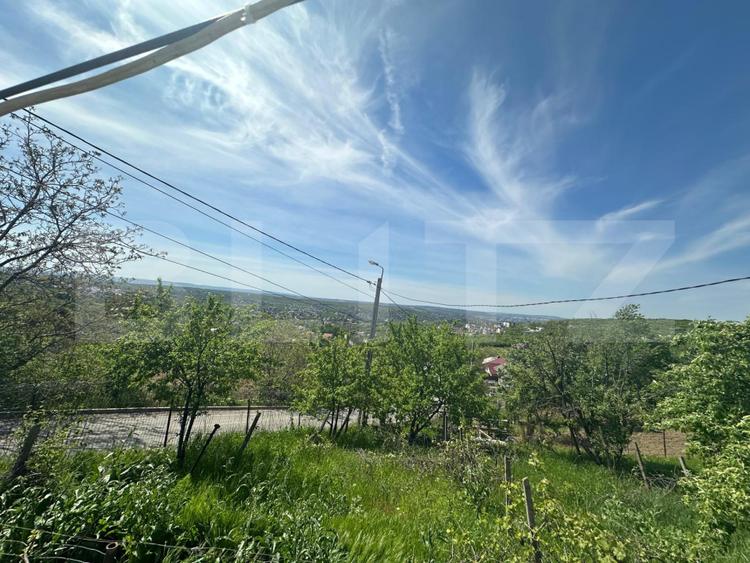 Casă de vânzare, 76 mp utili, teren 1.500 mp, vedere panoramică, zona Bucium