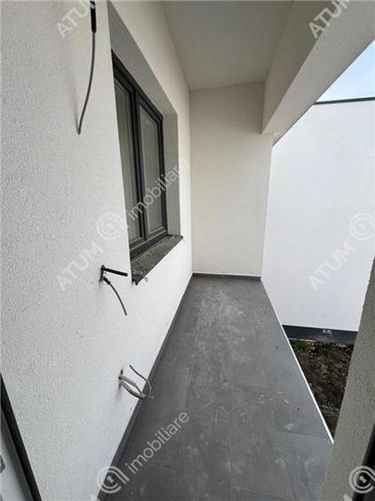 Casa cu 4 camere 2 bai curte de 50 mp zona Calea Cisnadiei Sibiu