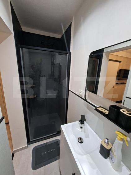 Garsoniera moderna, , zona Astra, renovata complet, centrala si aer conditionat