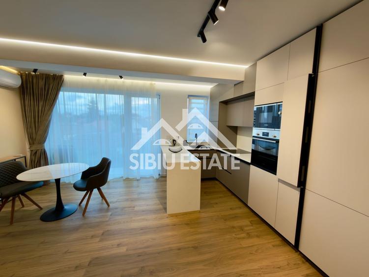 Apartament central finisare premium parcare subterana imobil nou
