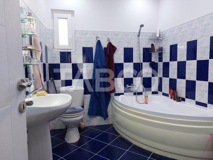 Casa si curte pretabila pentru 2 familii 980 mp teren liber Cisnadie