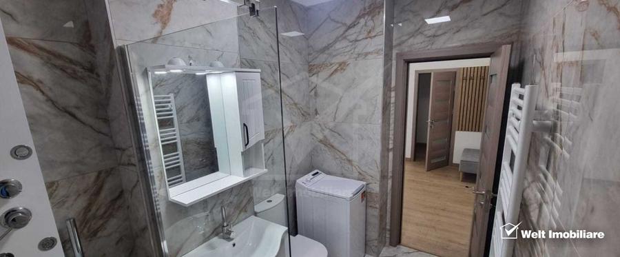 Apartament 2 camere balcon si parcare , la intrare in Floresti