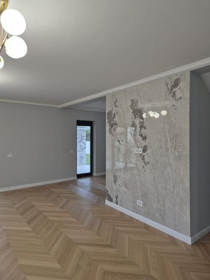 Locuinta individuala cu garaj si teren de 1000mp