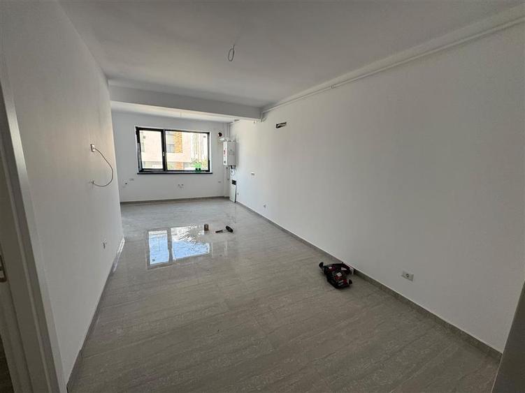 Apartament tip studio cu dressing, 55 mp utili, bloc nou